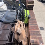 cardboard & junk luggage please collect the cardboard, 1 black garbage bag, and 1 green suitcase sitting out in front of my house stashed behind my garbage bins. E5 - removed for £50