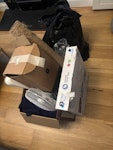 Box & bag of assorted rubbish Box of rubbish, including a fan, cat pole etc and box of coffee items; boxed unused toilet seat; bin bag of rubbish TW11 - removed for £40