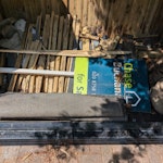 Dismantled shed, rug, mattress Dismantled shed - mostly wood waste and some plastic guttering, two composite work tops, a small bag of broken roof slate, a small cot mattress and a rug. Easy access via back gate TW8 - removed for £140