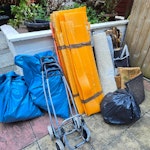 10 sacks + few more items 10 x rubbles sack
1 x small roll of carpet
3 x bundle of light plastic sheets
6 x doormats (bundled)
2 x trolley frames
I small van is more than enough. W14 - removed for £95