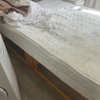 Two mattress and bed collected by waste management group