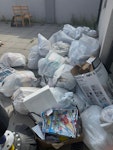 household rubbish household bin bags and some other stuff two bikes one coffee table. SL1 - removed for £150