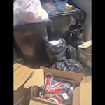 some bags and boxes around the empty the bims and all waste around it SS8 - removed for £90