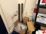 large shop collection lots of cardboard, boxes, chairs and fans. possibly chairs under cardboard boxes in final images. everything loose on the floor must go YO8 - removed for £300