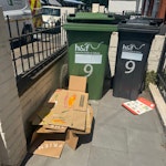 a green bin of mixed recycling mixed recycling largely cardboard boxes SW6 - removed for £60