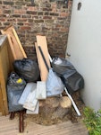 wood/pipes wooden planks/plastic pipes 5 black bags W4 - removed for £45