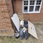 mixed waste mixed waste from a gas fire install. wood, cardboard, heat board off cuts and the pallet that its all sitting on can go also. KT22 - removed for £100