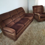 3-seat sofa & armchair Old 3-seater sofa and armchair, brown fabric covered, do not meet fire safety regulations for re-use. SL6 - removed for £95