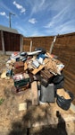 rubbish mainly books from loft rubbish from loft in garden ready to remove. access to garden from gate straight to road CM18 - removed for £120