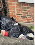 6 bags of rubble Bags of building materials not used, sand, etc.
Can drive onto pavement by removing bollards (small pin removed from base) that is how builders access pavement on Church Walk. Probably easier to access when less busy and motor garage is closed (as they have cars parked all around). N16 - removed for £50