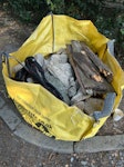 1 Hippo Midibag of rubble etc From garden projects: broken up concrete base from relaying paving, rotten timber, broken large urn, large tree band. CM16 - removed for £90