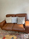 Two leather sofas. Two brown leather sofas. Remove from living room and dispose of.  This is a two man job with a Transit type van ST5 - removed for £140