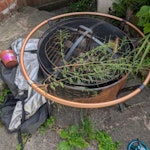 Assortment of waste 2 x old small bins (one contains rubble, one has general waste)
1 x fire pit with old logs (potentially reusable)
1 x wheel barrow
4 x Spare roof tiles/slates
4 x thin lengths of wood (about 7m long) M6 - removed for £80