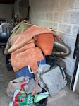 Pile a rubbish in garage It’s a mixture of dirt, wood, old chairs, old carpet etc NP15 - removed for £300
