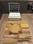 Clothes rack/boxes/packaging I am looking to get rid of. A clothes rack with a missing foot, some cardboard boxes which I’ve already broken down, and 1 styrofoam box with some additional styrofoam panels. Thanks! N1 - removed for £35