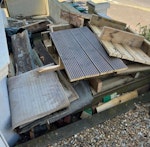 Old decking/wood + 2x old rugs This is old decking from our back yard. It's too big and too much for us to remove with our car. There are lots of screws in it still, so you would need to be careful when removing it. BN2 - removed for £100