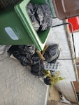 mixed waste black bags of mixed waste, contents of wheelie bin and rubbish to the right, green waste, metal bar BN10 - removed for £100