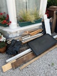Wooden/MDF moulding Skirting board, architrave and floorboards stripped from a single room. Also a couple of bits of metal fencing and desk matting N15 - removed for £100