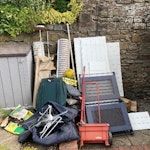 A collection of mixed waste Hangers, baby play pen, mdf panelling offcuts, lamps, astroturf (cut up into smaller pieces, garden equipment, old suitcase, mirror and a few other bits and pieces S7 - removed for £125