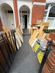 Floor boards, cupboards first 2 photos are of cupboards/shelves lying in front of the house with easy access from the street. The third photo is of floor boards lying at the back of the house also on ground floor but 2 steps to enter house and then 2 steps down SW6 - removed for £470