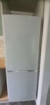 small fridge/freezer Small freestanding fridge/freezer in good working conditions. No issues regarding functioning. There are a couple of marks on the doors left by fridge magnets when they were removed. There is also a small dent in the bottom door that does not affect item's performance. M33 - removed for £65