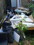 12 bags .old toilet  .plastic 12 rubbish bags old toilet .plastic chairs and table .bits of wood and cardboard SW19 - removed for £150
