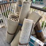 Rolled up carpet and flooring Rolled up carpet and 3 small boxes of flooring off cuts need gone asap E3 - removed for £65