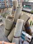 Rolled up carpet and flooring Rolled up carpet and 3 small boxes of flooring off cuts need gone asap E3 - removed for £65