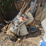 DIY / Building waste approx 10 bags of building waste, offcuts of Chipboard/OSB, offcuts of Plasterboard, offcut of Carpet. A few small loose off cuts of wood, plastic pipe, metal. Note some of the white bags have unfortunately started to fall apart. NW10 - removed for £125