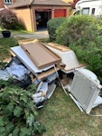 builders waste light weight bath, toilet, basin, shower screen, radiator, 10 bags of builders waste some cardboard MK16 - removed for £230