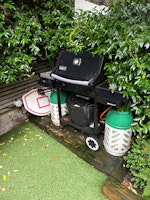 two bycicles and an old barbec collected by Capital Recycle LTD