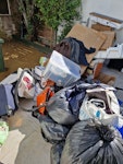 lots of rubbish lots of different waste. old clothes, materials, rubbish, clearing out shed W3 - removed for £150