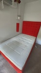 Small Double Bed with Mattress Bed frame with headboard. Bed frame is solid block liftable by two people. Mattress with bed also. SE17 - removed for £80