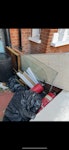 Wood and tiles wood,smashed up tiles in black bag, bath screen glass, extinguishers SW17 - removed for £85