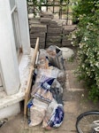 Rubble bags + concrete pavers 11 rubble bags:
4x plaster
4x bricks/slabs (filled less and portable)
2 timber
1 other (plaster/electrical/etc)
--
1 door + 1 small particle board
1 concrete bird pool
62 thin, square equivalent concrete pavers (some larger than square, some smaller than square); could be reuse though some have chipped edges and concrete stains NW5 - removed for £200
