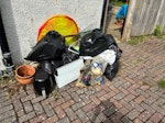 as described 1) small amount of general rubbish by side of house inc some sand in bags
2) tree cuttings at back garden 

You can back your van into the drive right next to the first lot. You will need to move the tree bits about 30 yards from the back of the garden to the back gate. 

Two very small and easy jobs no more than 15 mins so after realistic price. CR0 - removed for £80