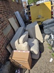 5 items sofa, wood, cardbox 2 sofas, one cardboard box full of ripped cardbox boxes, 2 pieces of wood: large desk plywood and laminated wood. Please note mattress,suitcase, shopping trolley or other waste is not mine. Please do not quote for those EN6 - removed for £100