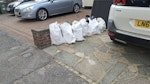 9 Rubble bags and 5 Soil bags 9 bags of rubble and 5 bags with soil.  These came from a demolished planter. Located on the driveway for covenient collection. SM5 - removed for £95