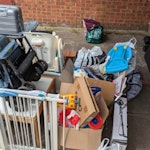 bags, boxes, bric-a-brac Kids scooters, kids table, small kids single bed frame disassembled+ kids mattress, baby high chair, pushchair, 1 garden chair, 1 suitcase, 2 stair gates, 2 medium boxes of bric-a-brac, 1 large suitcase, 1 sack barrow, 1 large TV unit disassembled, 2 black bin bags of clothes UB6 - removed for £120