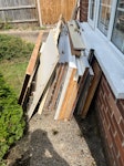 Mostly wood-based waste. 11 doors (3 with glazing, which may not meet current standards).  Cast-offs from kitchen renovation.  Apart from the glazing and some short lengths of copper pipe, all is wood-based. PE30 - removed for £195
