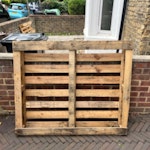 household & DIY waste 1 wooden pallet, some wood / door / lino / metal from cellar clear out building work, 1 x ironing board, 1 x small wheelie bag, 1 x bucket and bin, 1 x old rake E8 - removed for £80