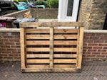household & DIY waste 1 wooden pallet, some wood / door / lino / metal from cellar clear out building work, 1 x ironing board, 1 x small wheelie bag, 1 x bucket and bin, 1 x old rake E8 - removed for £80