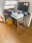 4 seater L shaped sofa + desk L shaped 4 seater sofa
Glass desk on wooden legs
Both items must be taken apart in order to fit at the stair case. SW7 - removed for £175