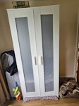 A wooden wardrobe A wooden wardrobe and a small bedside table left outside the flat. The picture uploaded is when the wardrobe was inside the flat RH2 - removed for £50