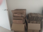 Cardboard Removal boxes (c.80) Reusable Cardboard removal boxes flattened and stacked in 8 boxes (around 10 flattened boxes to a box) for easy removal. Also one cardboard garment carrier with rail and 11 separate flattened book boxes. All take up approx 5ft x 5ft floor space. To be collected from 4th floor flat with good-size lift. Parking for 'white van'. CR8 - removed for £60