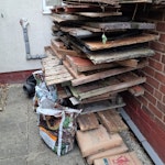 old shed and contents old garden shed, plastic sewer chamber, 2 refuse bags with roof felt, one with old cement, hand saw and 3 old bags cement B71 - removed for £150