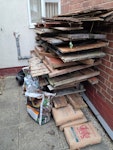 old shed and contents old garden shed, plastic sewer chamber, 2 refuse bags with roof felt, one with old cement, hand saw and 3 old bags cement B71 - removed for £150