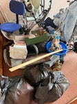 Old items wall unit Old mobility items 2 bedside table one chest drawers 1 book case dustbin bans 20 old hoovers card table old wood old small carpet mobility chair and walkers 3 side tables just household IG7 - removed for £150