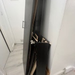 Dismantled Wardrobe A tall black wardrobe which has been dismantled NW6 - removed for £75