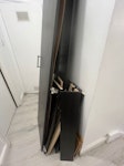 Dismantled Wardrobe A tall black wardrobe which has been dismantled NW6 - removed for £75